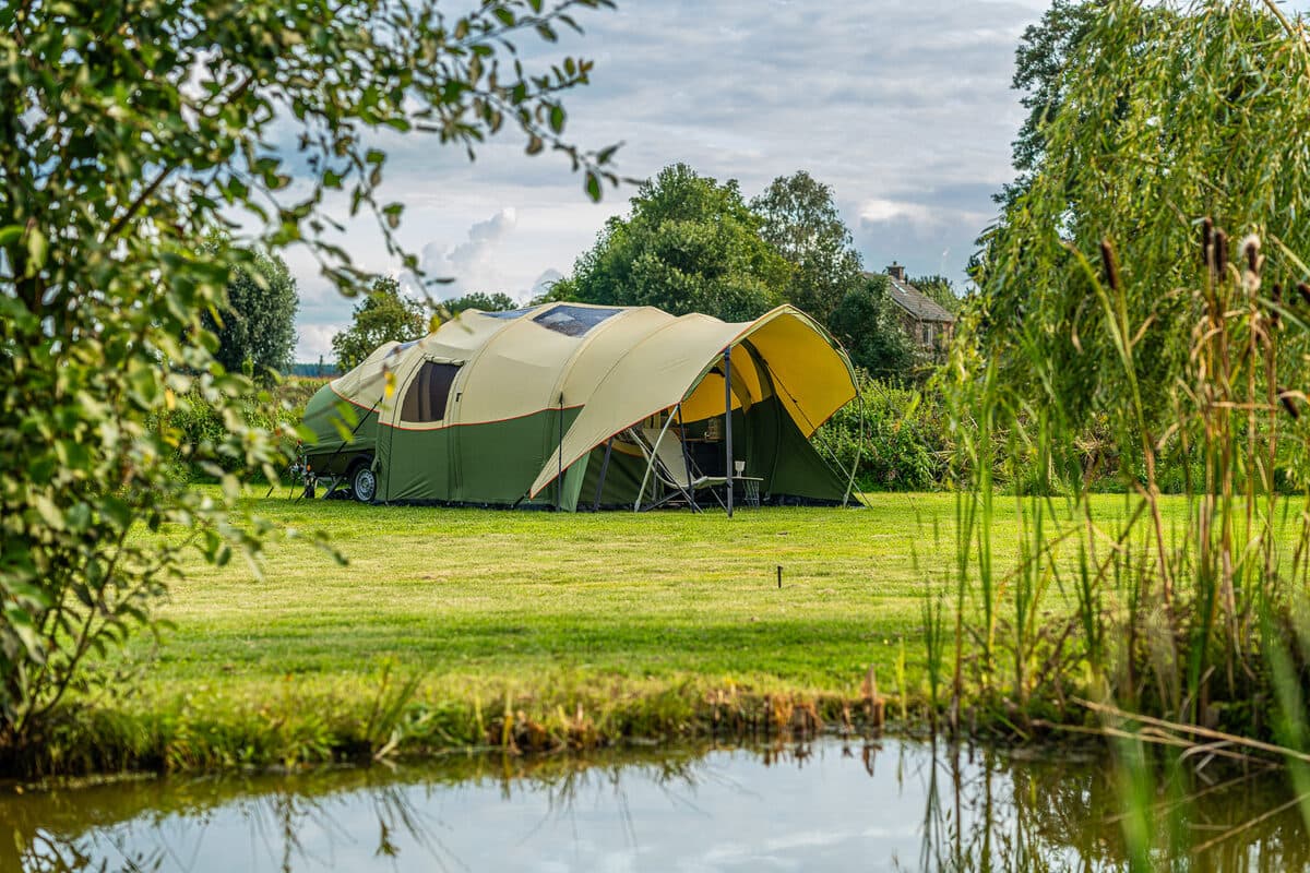 Alpenkreuzer trailer tent erected at campsite